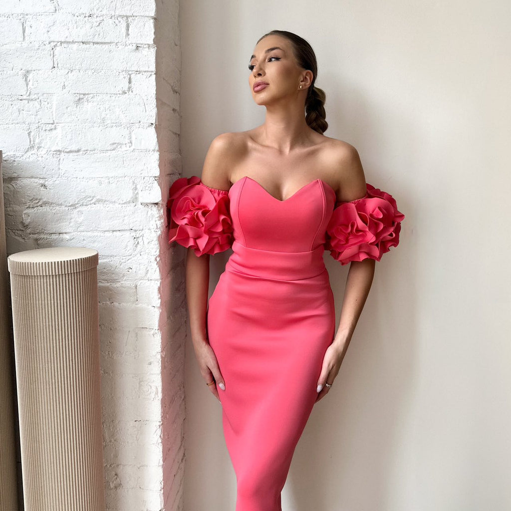 woman wearing pink off shoulder dress with ruffled sleeves woman wearing pink off shoulder dress with ruffled sleeves