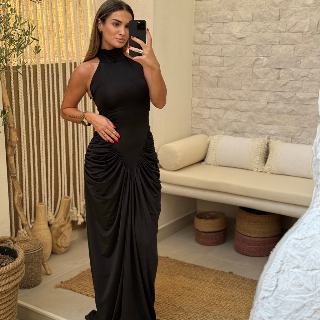 woman in black dress in modern room woman in black dress in modern room