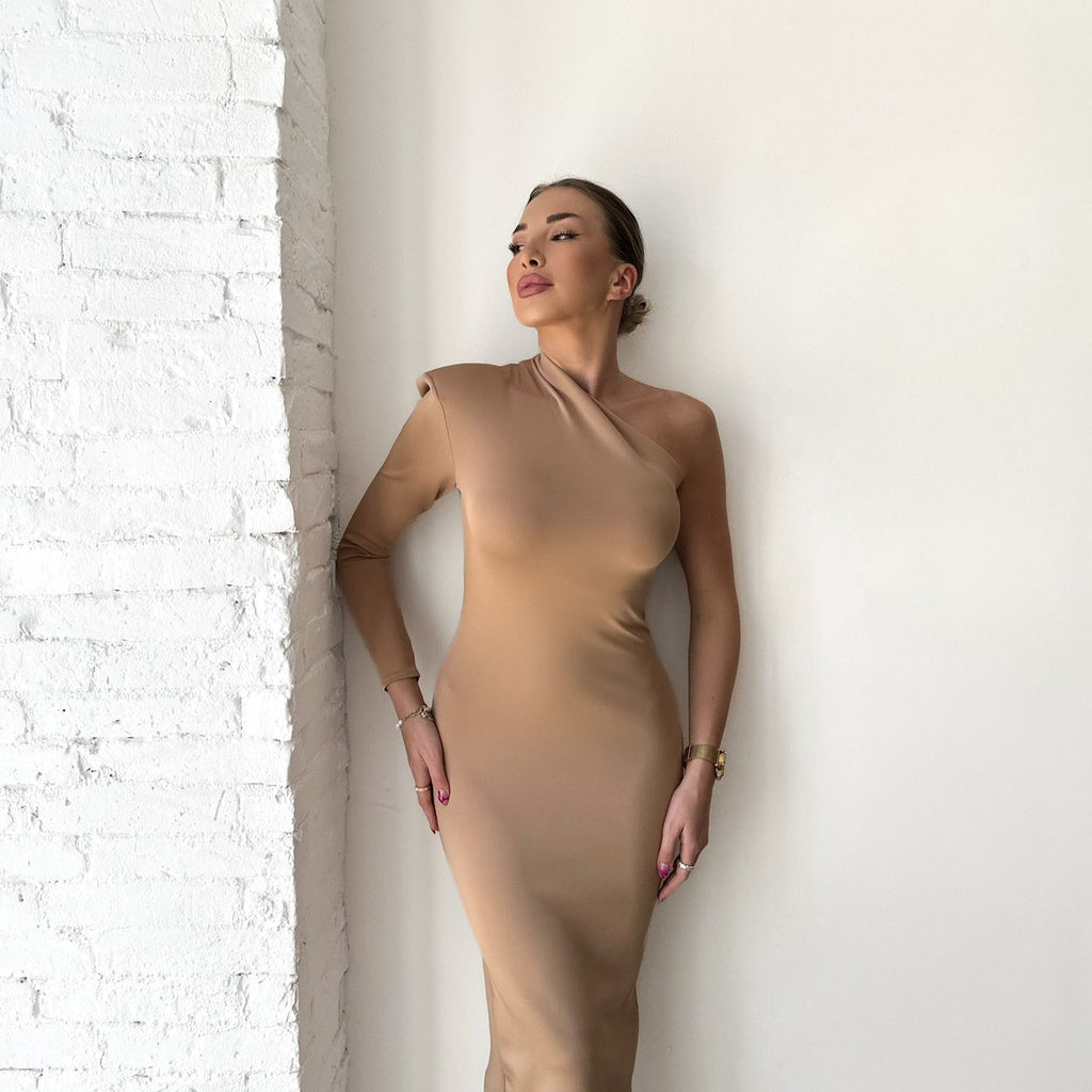 beige one shoulder bodycon dress on woman beige one shoulder bodycon dress on woman