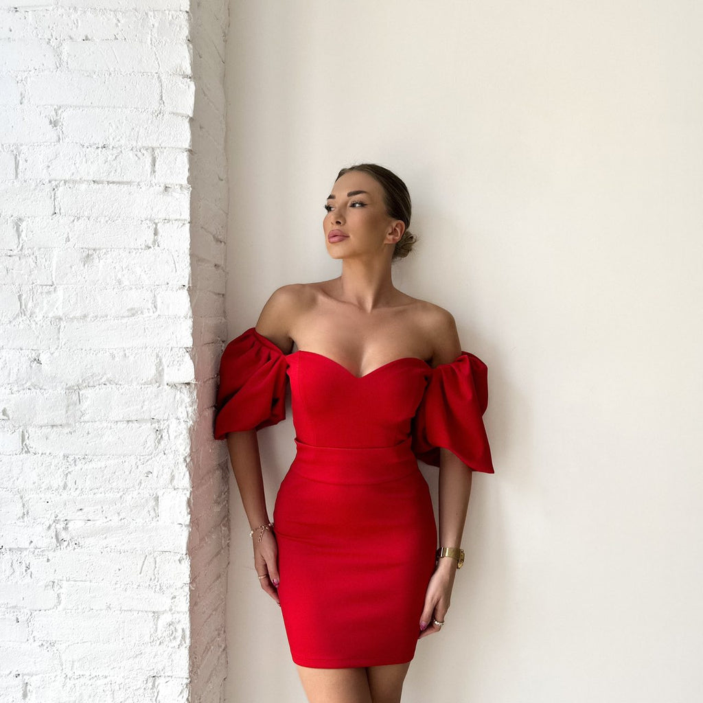 woman wearing off the shoulder red dress woman wearing off the shoulder red dress
