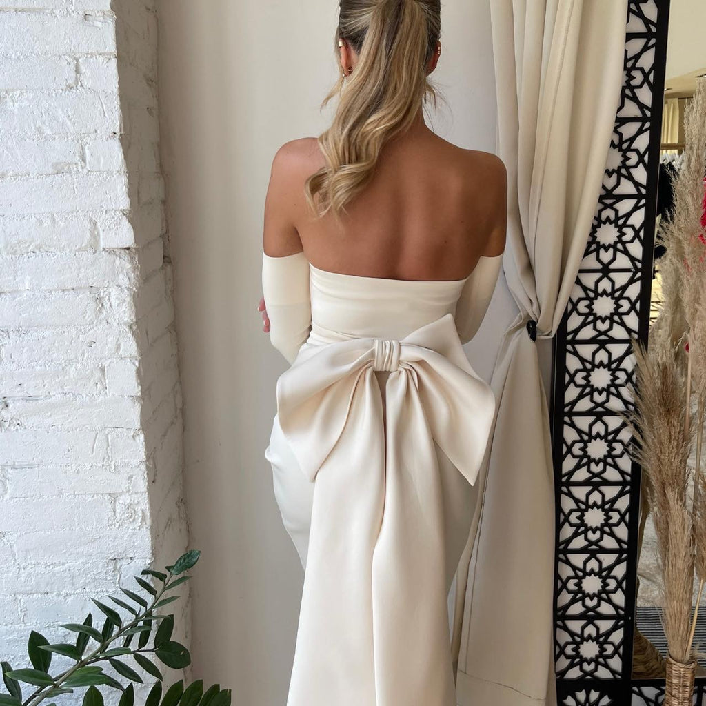 elegant off the shoulder white dress with back bow elegant off the shoulder white dress with back bow