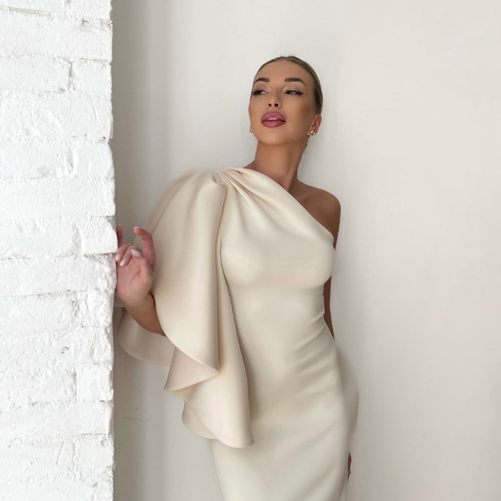 elegant one shoulder cream dress on model elegant one shoulder cream dress on model