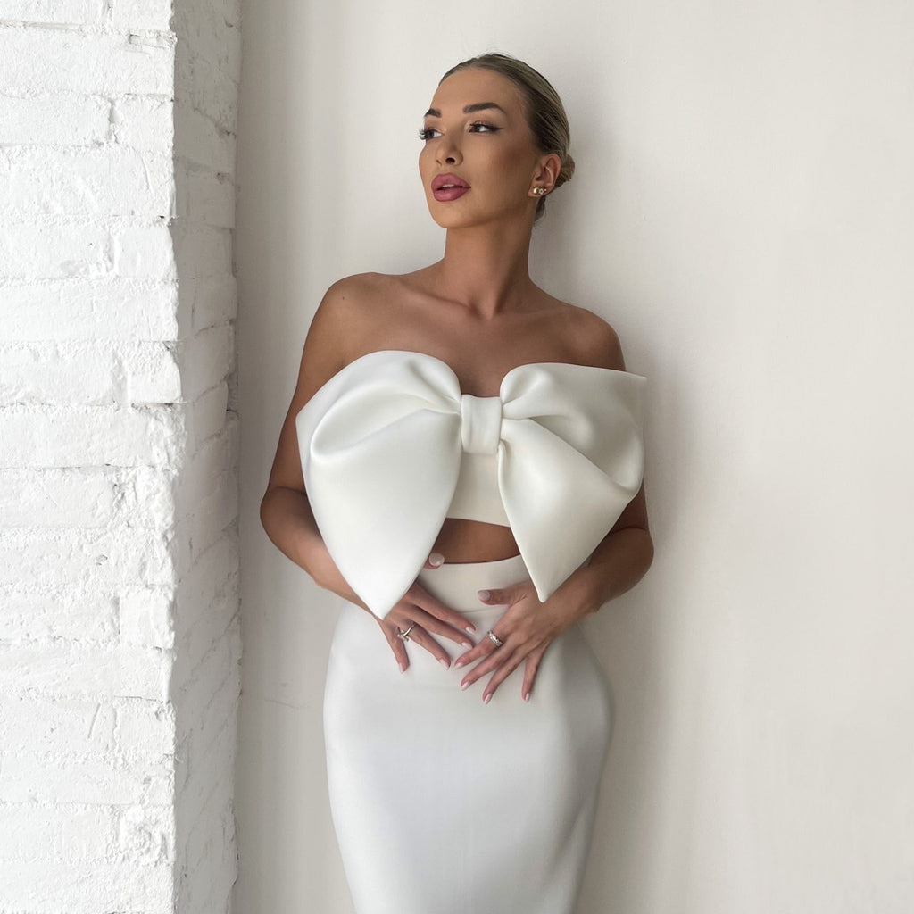 white dress with large bow design white dress with large bow design