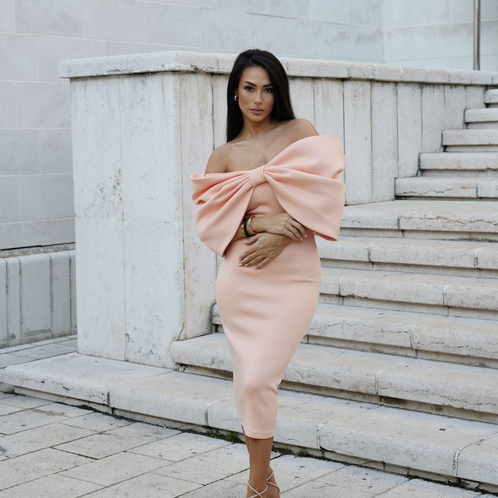 sleeveless peach dress with large bow detail sleeveless peach dress with large bow detail