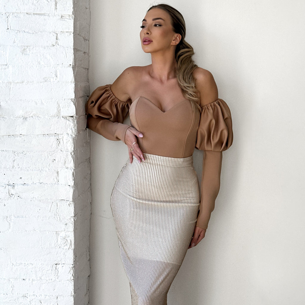 woman in elegant off shoulder dress woman in elegant off shoulder dress