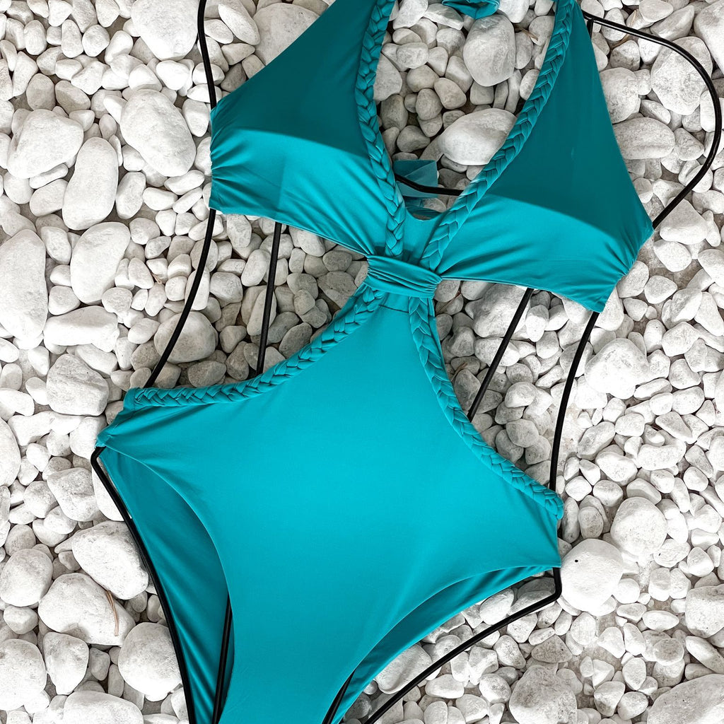 teal cutout swimsuit on white pebbles teal cutout swimsuit on white pebbles