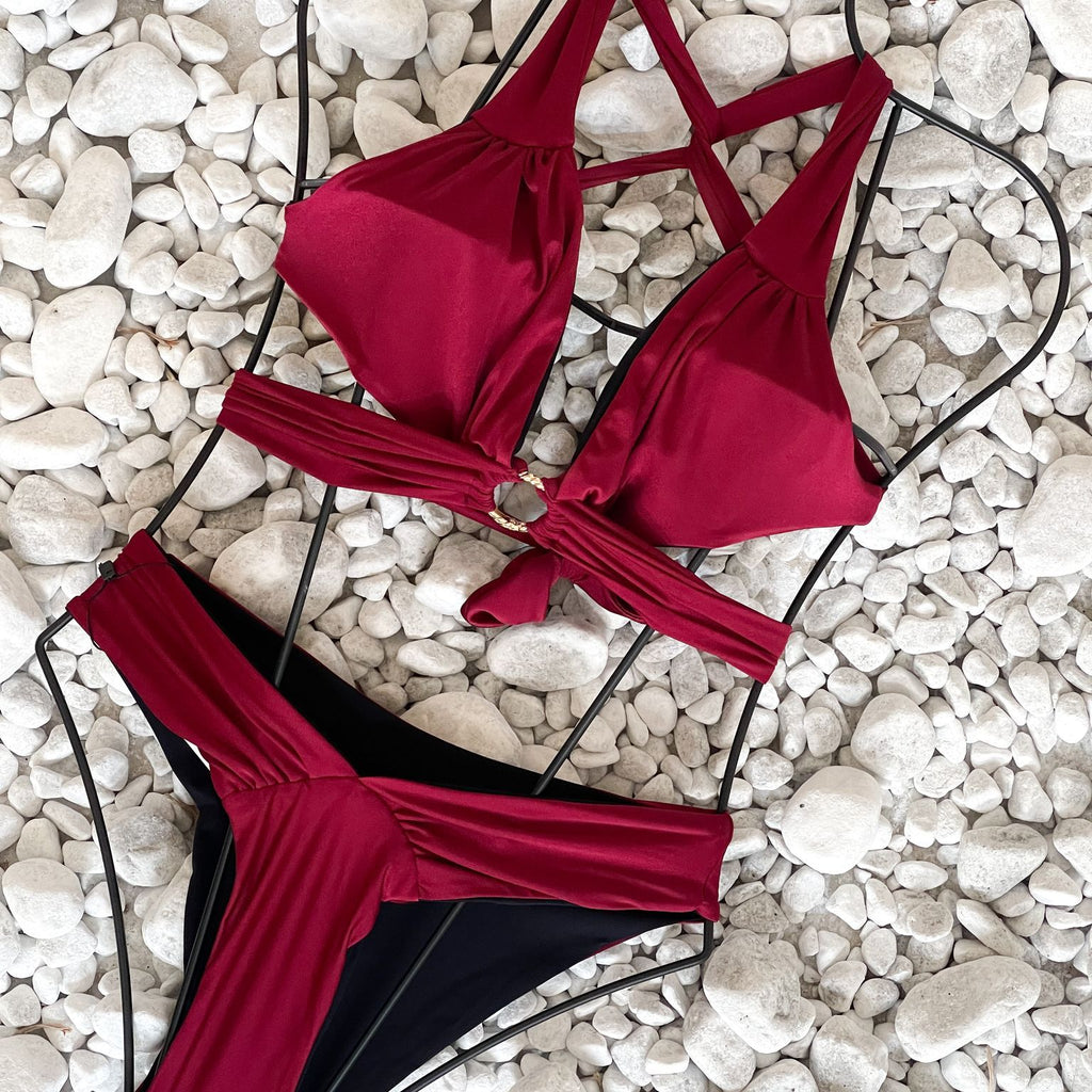 red bikini on white rocks red bikini on white rocks
