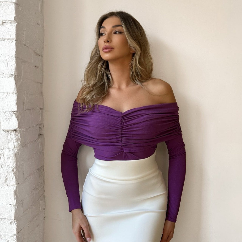 woman in purple off shoulder top and white skirt woman in purple off shoulder top and white skirt