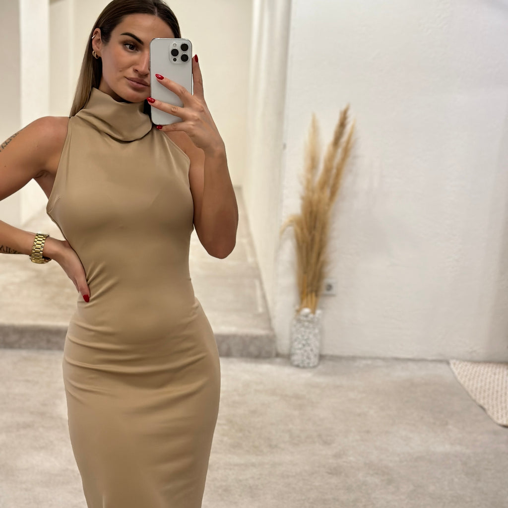 beige sleeveless turtleneck dress fashion showroom beige sleeveless turtleneck dress fashion showroom