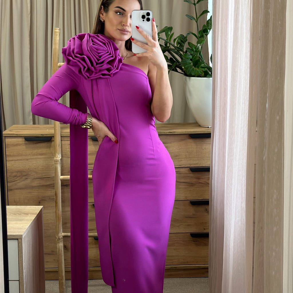 woman in pink one shoulder dress with floral detail woman in pink one shoulder dress with floral detail