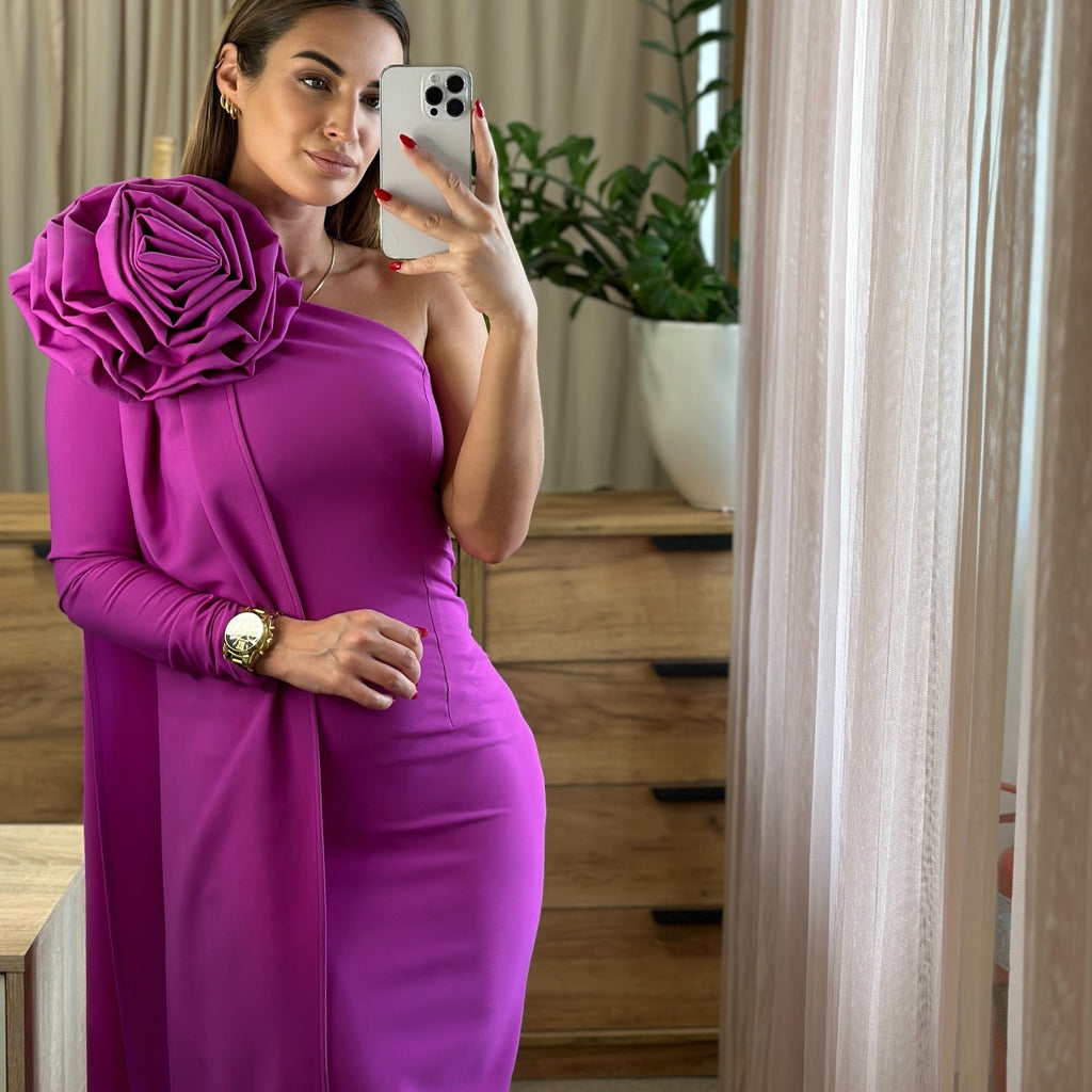 woman wearing one shoulder pink dress with floral detail woman wearing one shoulder pink dress with floral detail