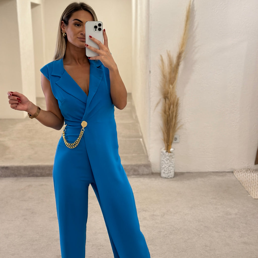 blue jumpsuit with gold chain detail blue jumpsuit with gold chain detail