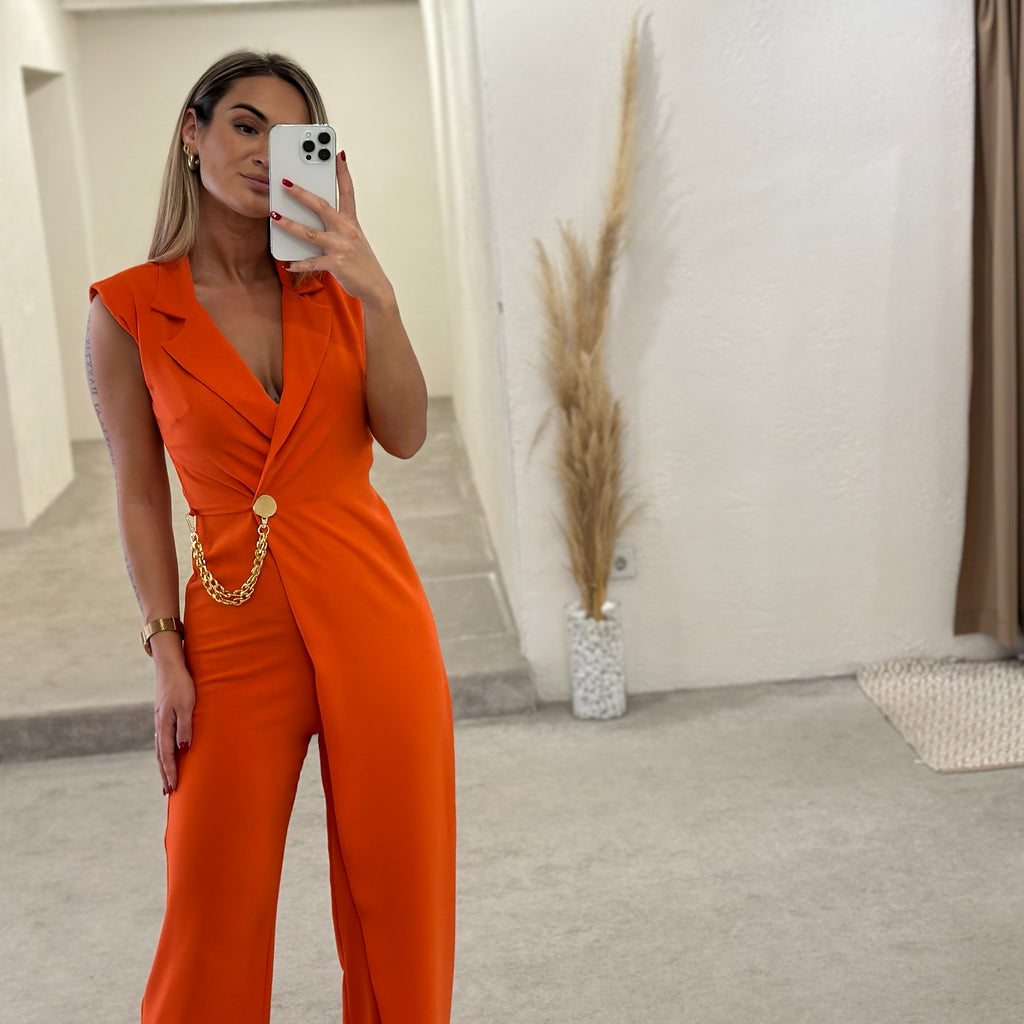 orange sleeveless jumpsuit with chain detail orange sleeveless jumpsuit with chain detail