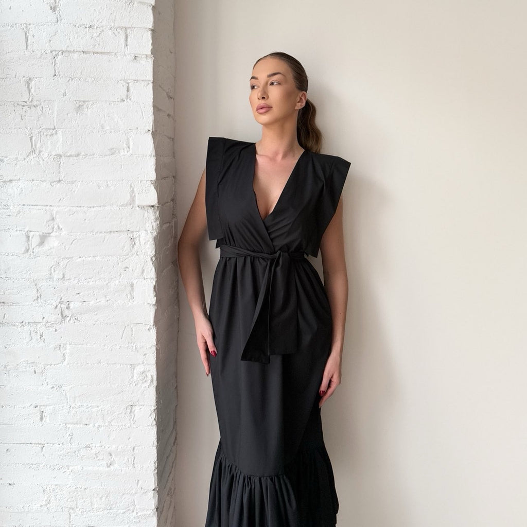 woman wearing elegant black maxi dress woman wearing elegant black maxi dress