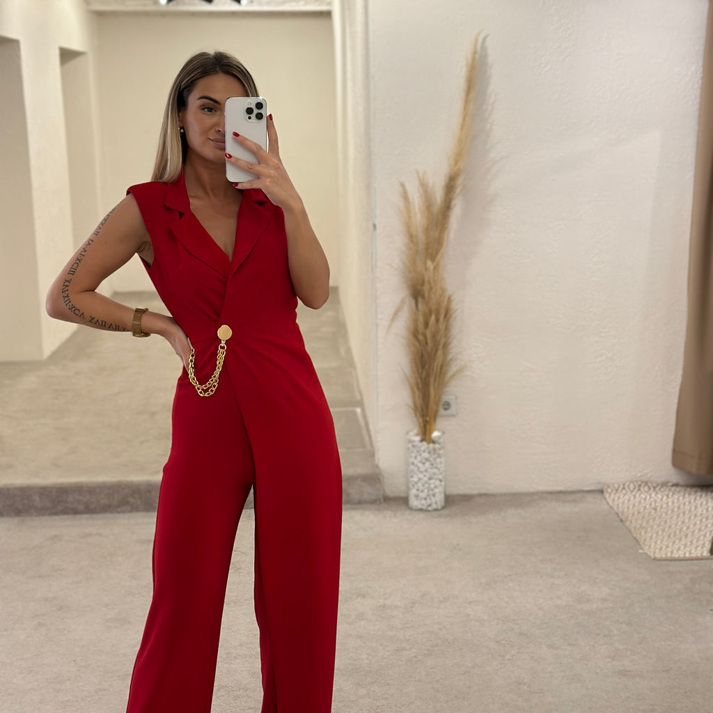 woman wearing red jumpsuit in modern dressing room woman wearing red jumpsuit in modern dressing room