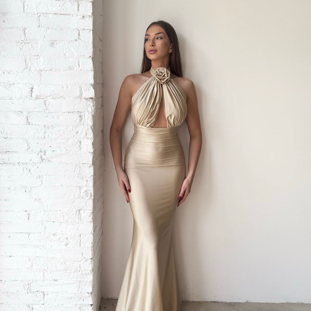 beige halter neck gown with rose detail beige halter neck gown with rose detail