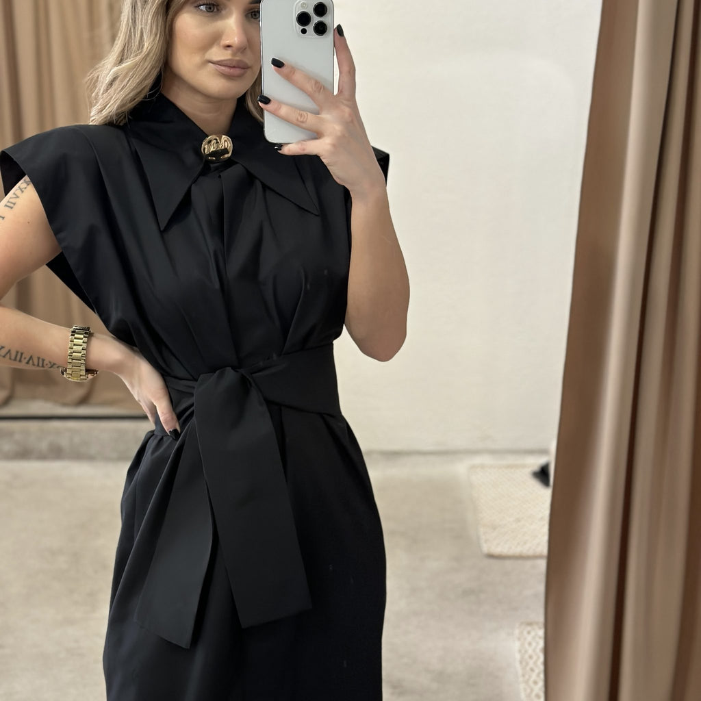 woman in black dress taking selfie woman in black dress taking selfie