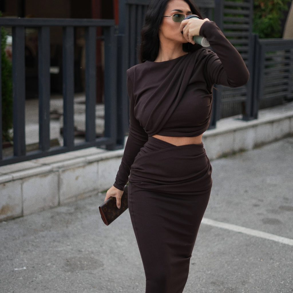 woman in dark brown two piece dress with sunglasses woman in dark brown two piece dress with sunglasses