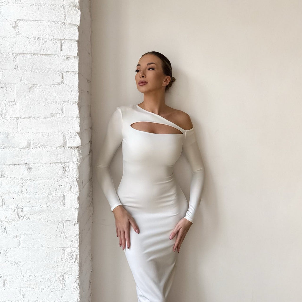 woman in white long sleeve midi dress woman in white long sleeve midi dress