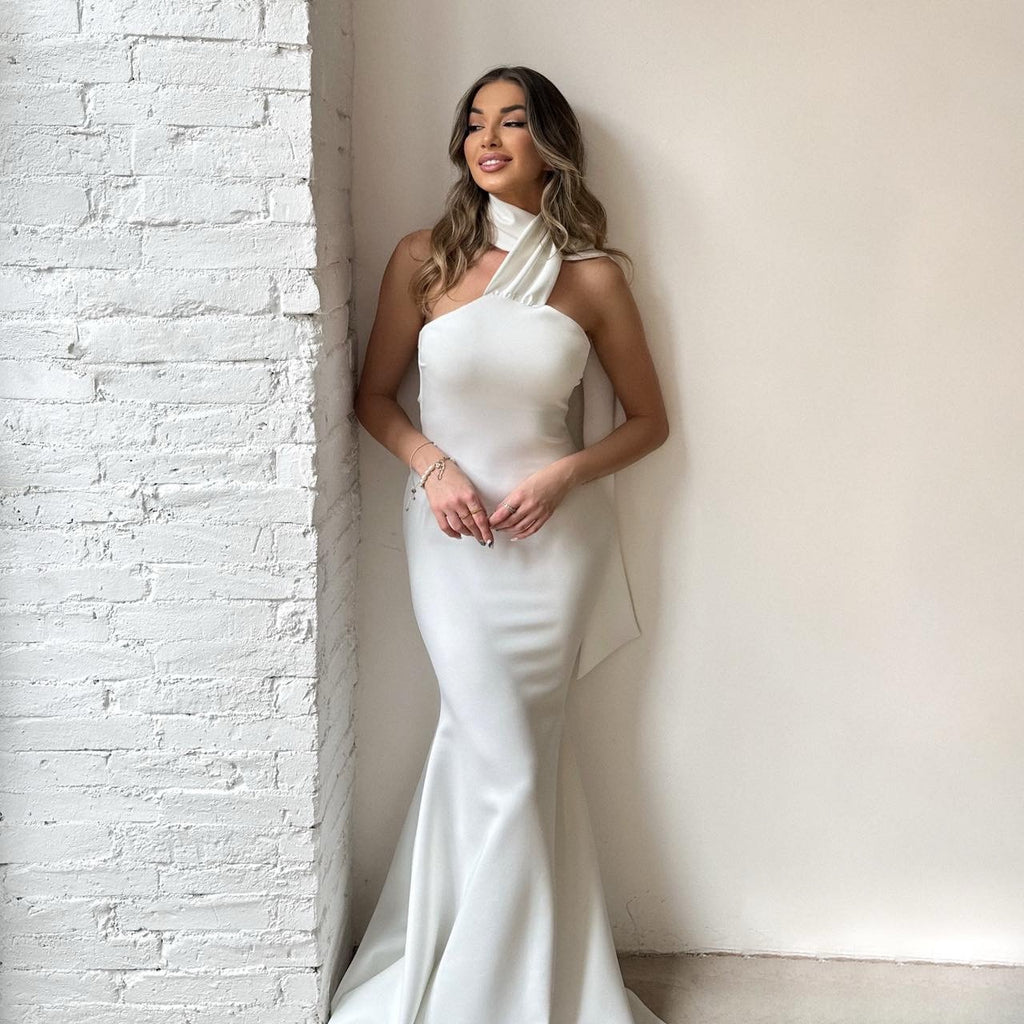 elegant white evening gown with one shoulder scarf detail elegant white evening gown with one shoulder scarf detail