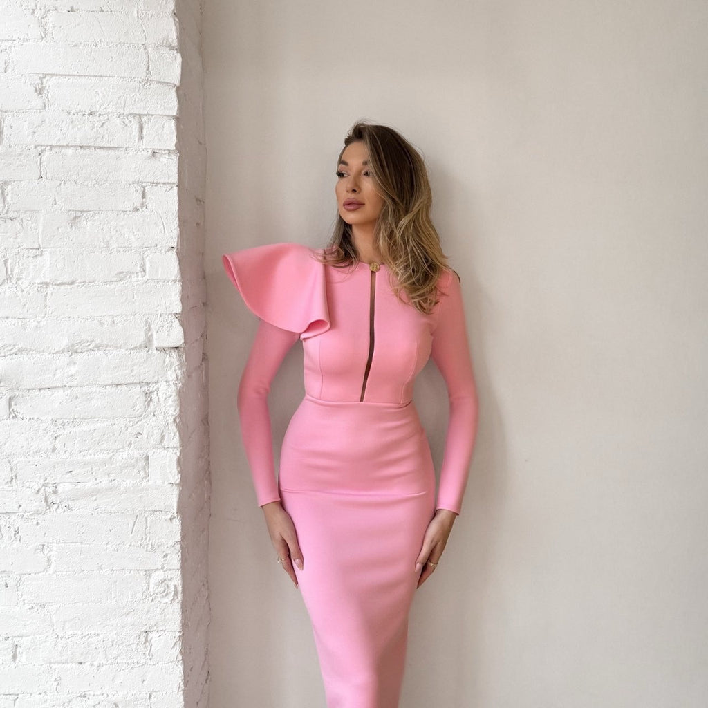woman in pink structured midi dress woman in pink structured midi dress