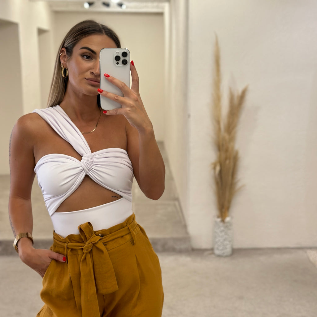 white twist top with yellow belted pants white twist top with yellow belted pants