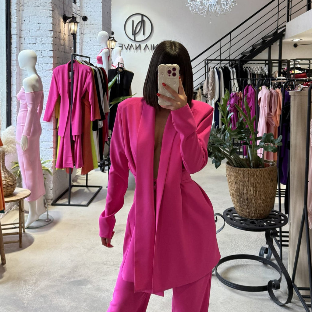 pink blazer and pants set in clothing store pink blazer and pants set in clothing store