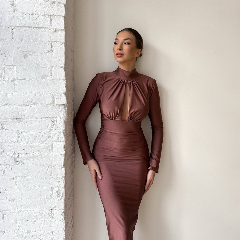 woman in elegant brown midi dress woman in elegant brown midi dress