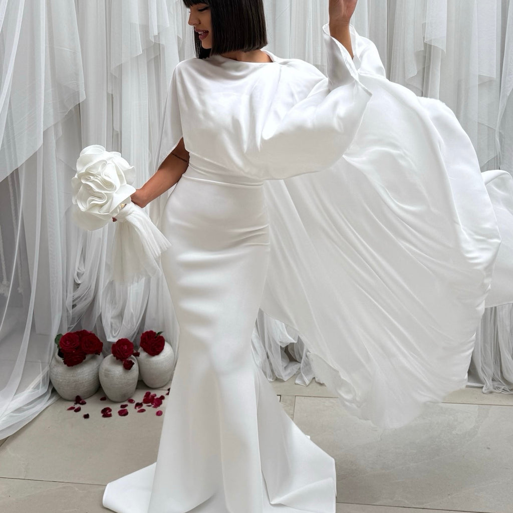 elegant white dress in flowing design elegant white dress in flowing design
