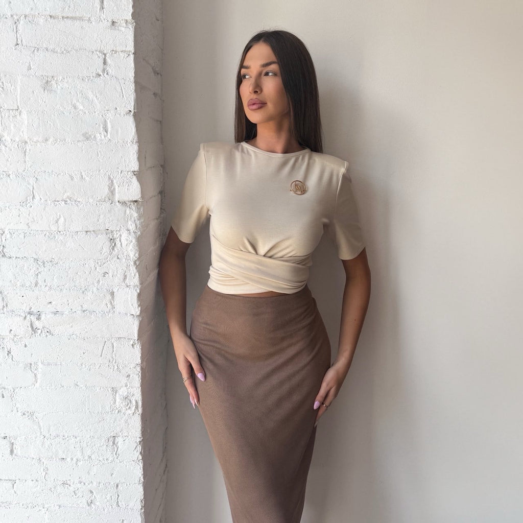 beige top and brown pencil skirt on woman beige top and brown pencil skirt on woman