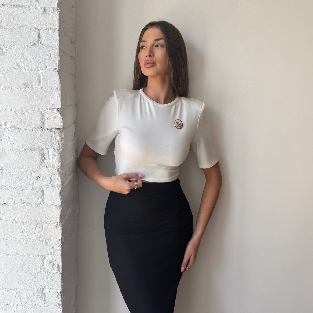 woman in white top and black pencil skirt woman in white top and black pencil skirt