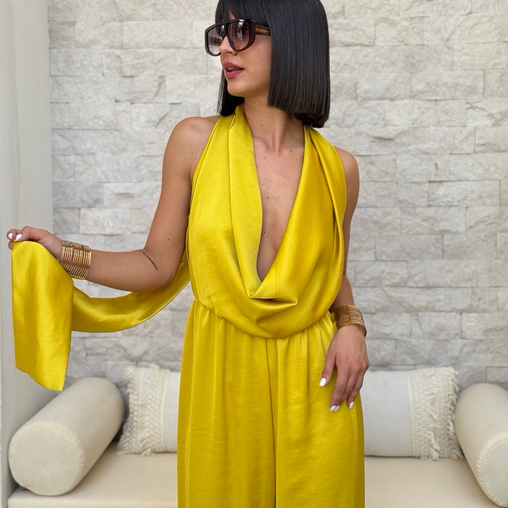 woman wearing yellow satin dress with sunglasses woman wearing yellow satin dress with sunglasses