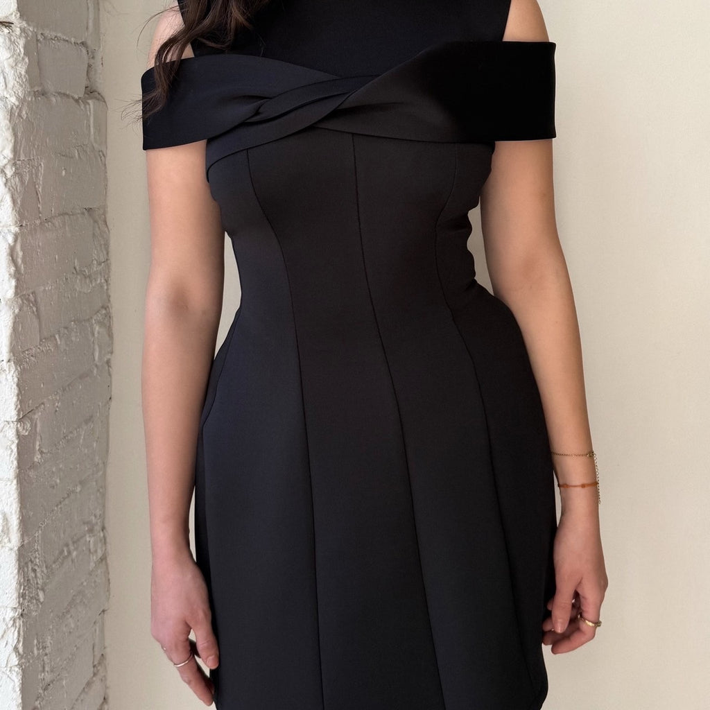 woman wearing elegant black off shoulder dress woman wearing elegant black off shoulder dress