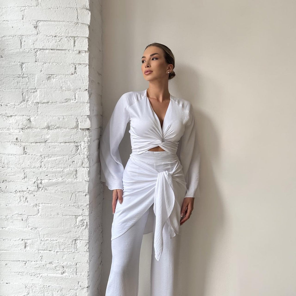 model in stylish white two piece outfit model in stylish white two piece outfit