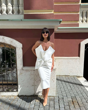 white off shoulder dress with bow detail