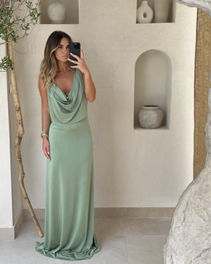 woman in sage green maxi dress