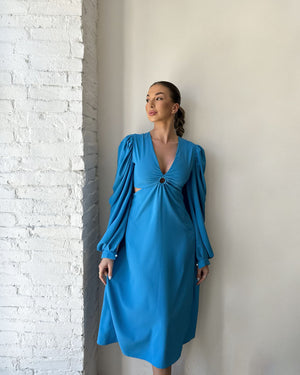 blue long sleeve dress with cutout design