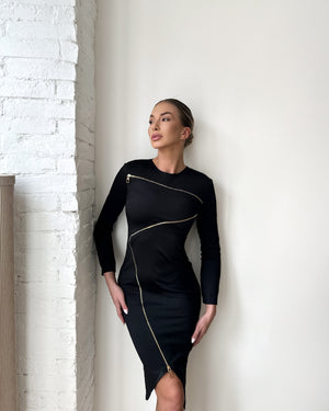 black long sleeve dress with gold zippers