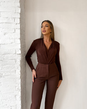 woman wearing brown long sleeve pants suit