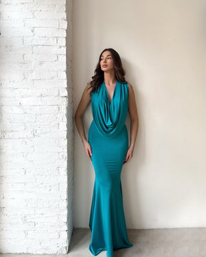 teal sleeveless gown with draped neckline