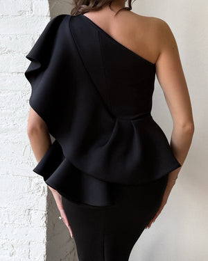 one shoulder black dress with ruffle detail