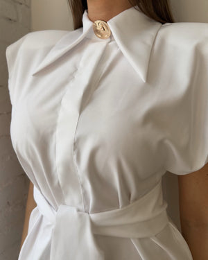 white dress with gold button detail