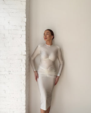 woman wearing white ruched midi dress
