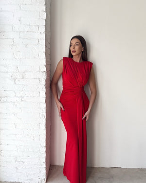 woman in sleeveless red evening gown