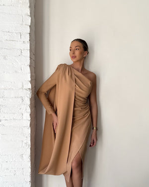 beige one shoulder dress worn by model