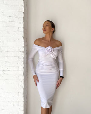 sleek off shoulder white dress with rose detail
