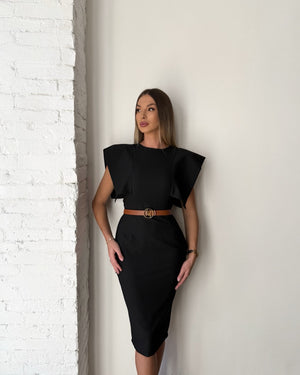 woman in elegant black dress with belt