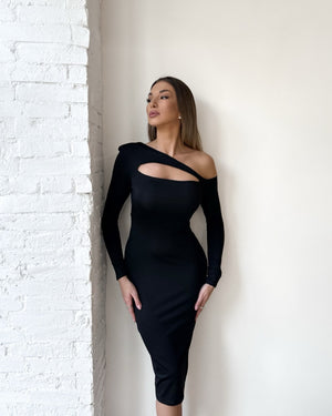 woman in elegant black cutout dress