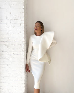 white sleeveless dress with elegant ruffle design