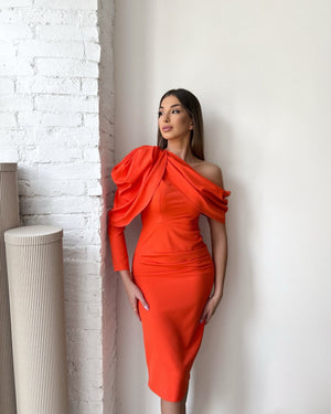 woman wearing orange off shoulder dress
